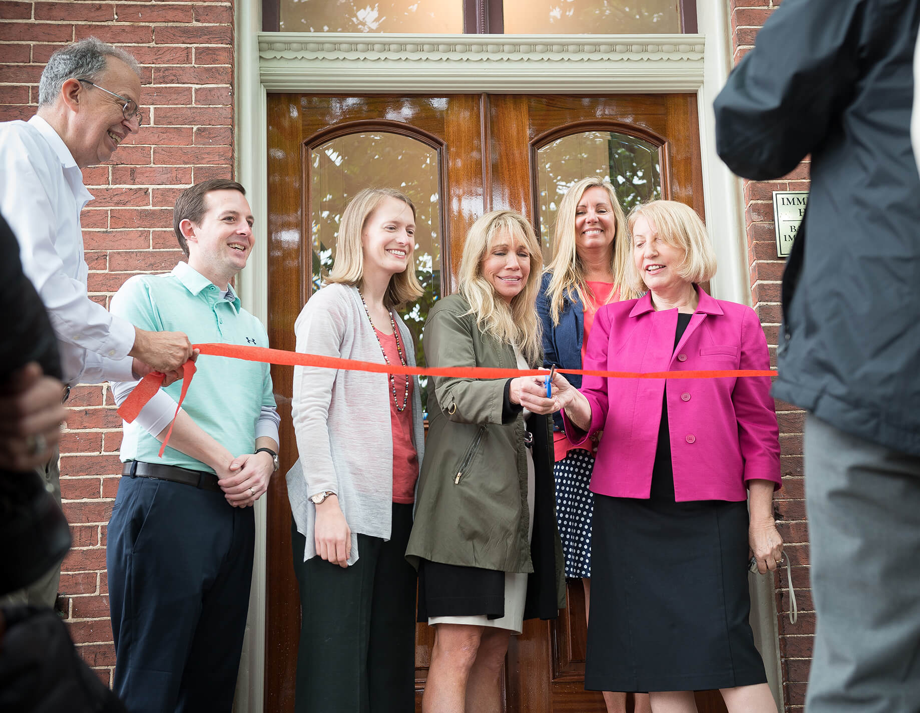 Ribbon cutting outside BIM